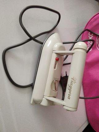 Plancha de viaje para ropa. 