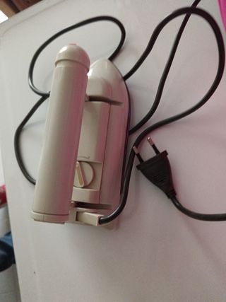 Plancha de viaje para ropa. 