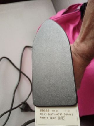 Plancha de viaje para ropa. 