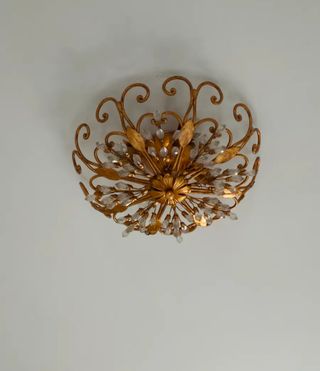 Lampadario in foglia oro e cristalli