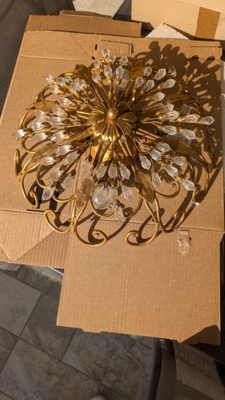 Lampadario in foglia oro e cristalli