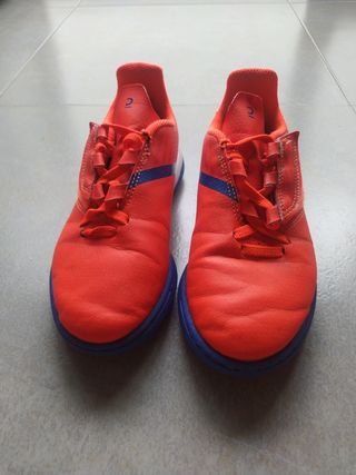 Botas fútbol multitacos niño