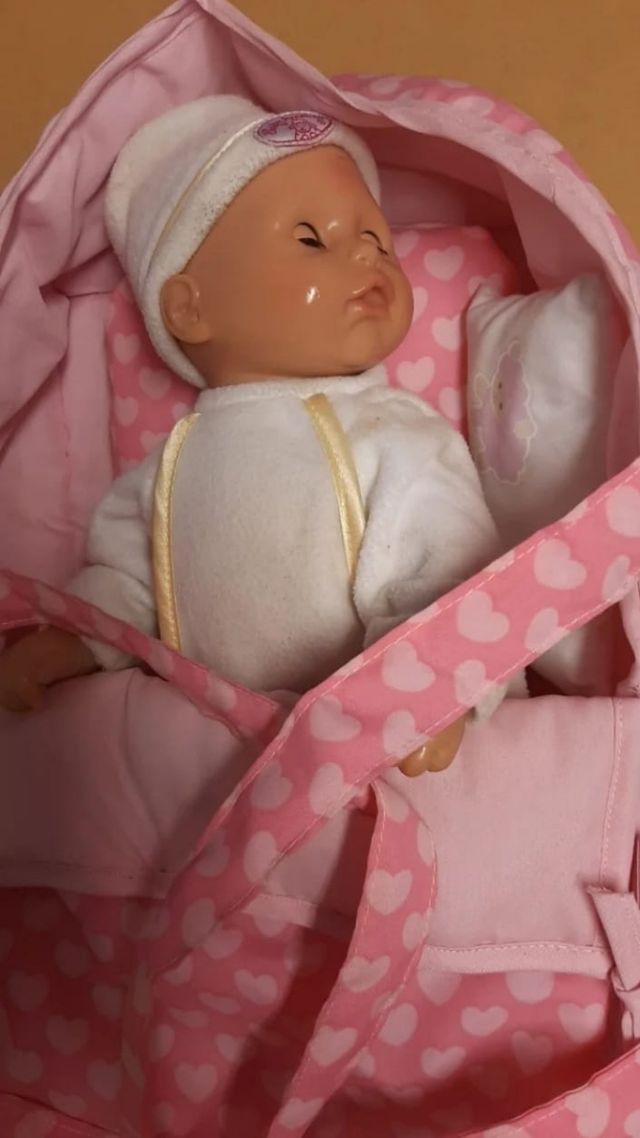 Set di giocattoli per culla e bambola.