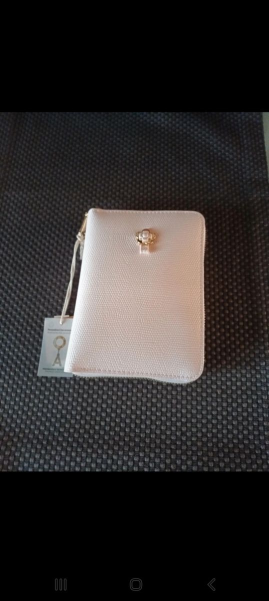 Portagioie da viaggio Carpisa