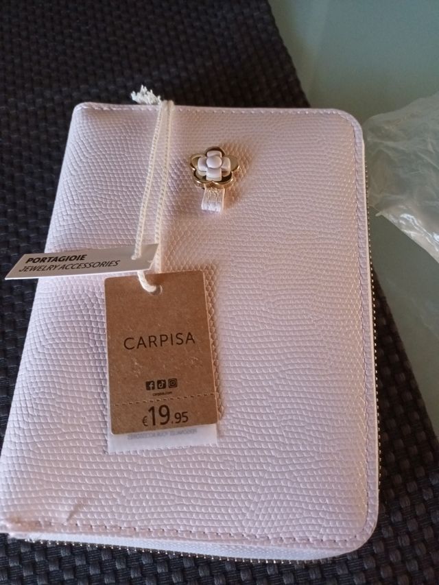 Portagioie da viaggio Carpisa