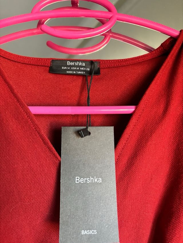 Mono corto mangas largas Bershka