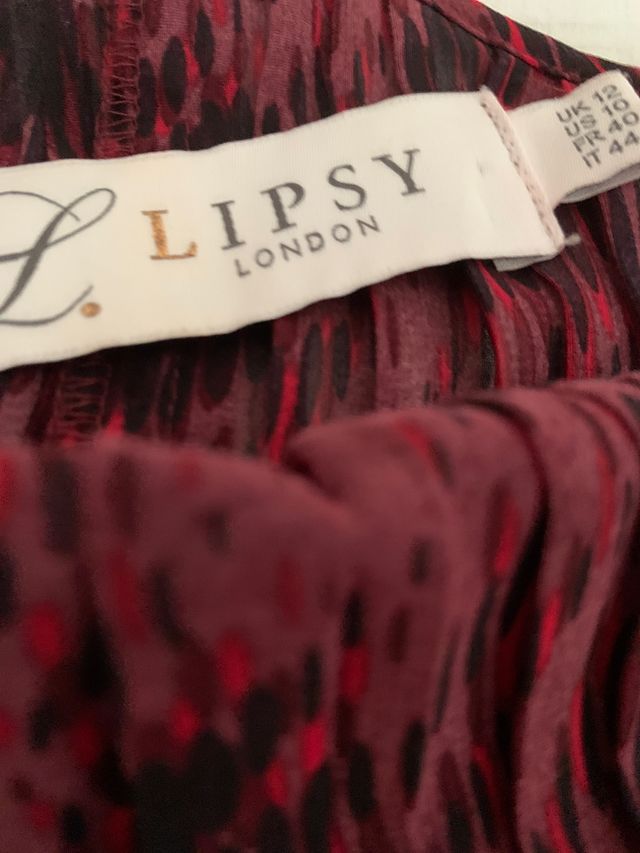 Camicia semitrasparente a manica singola marca Lipsy