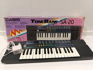 CASIO TONE BANK SA-20 CON CAJA Y ALIMENTADOR