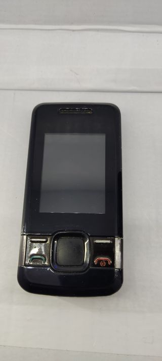 Nokia 7100 con auriculares Bluetooth.