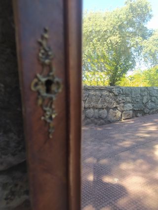 Espejo antiguo biselado nogal tallado