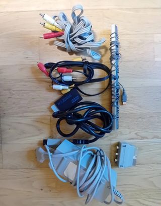 Consola wii ( volantes, micrófonos..