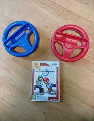 Consola wii ( volantes, micrófonos..