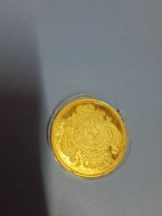 Moneda y sello
