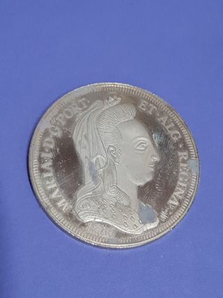 Moneda y sello