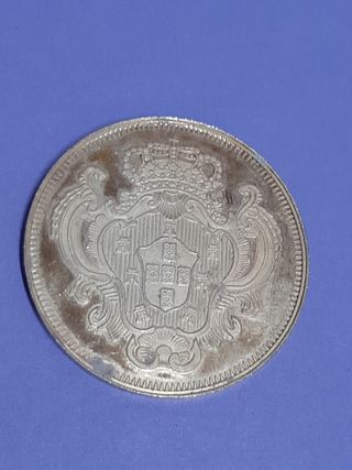 Moneda y sello