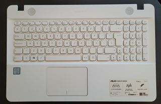 Frente portatil Asus F451U con teclado y touchpad