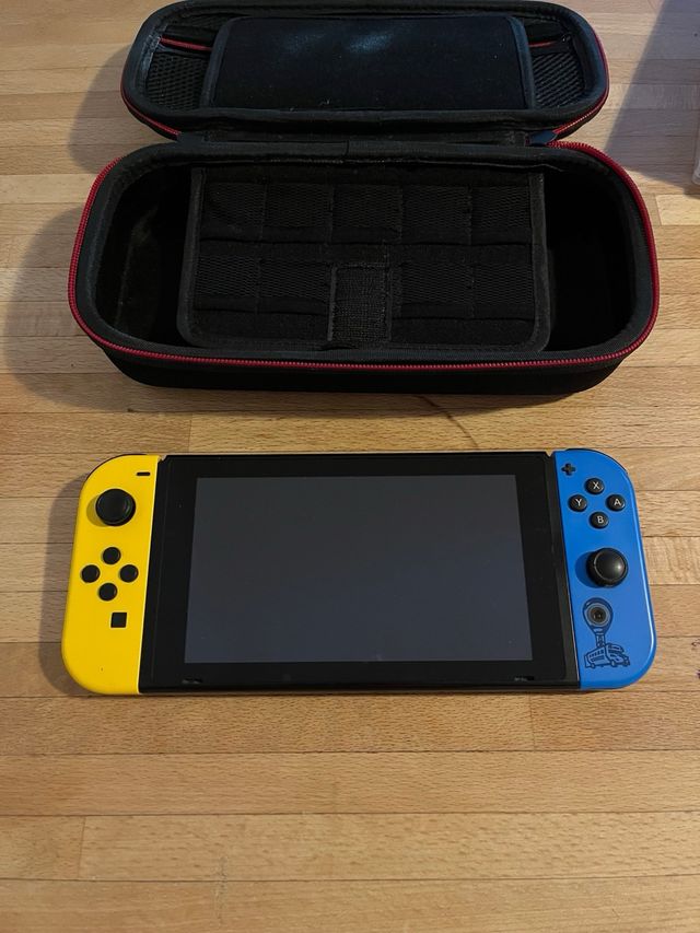 Nintendo Switch + 5 juegos y funda.