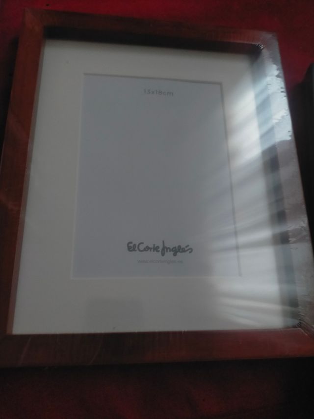 Marcos 6 de madera de el Corte Inglés.