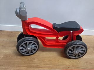 Moto juguete roja