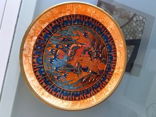 Piatto decorativo egizio in terracotta