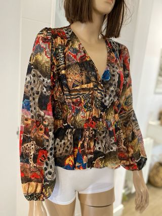 Blusa transsparente 
