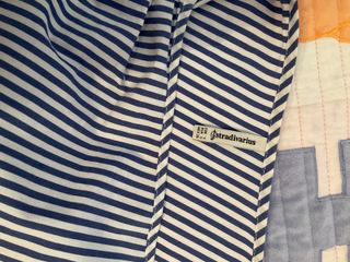 Blusa de rayas con una manga