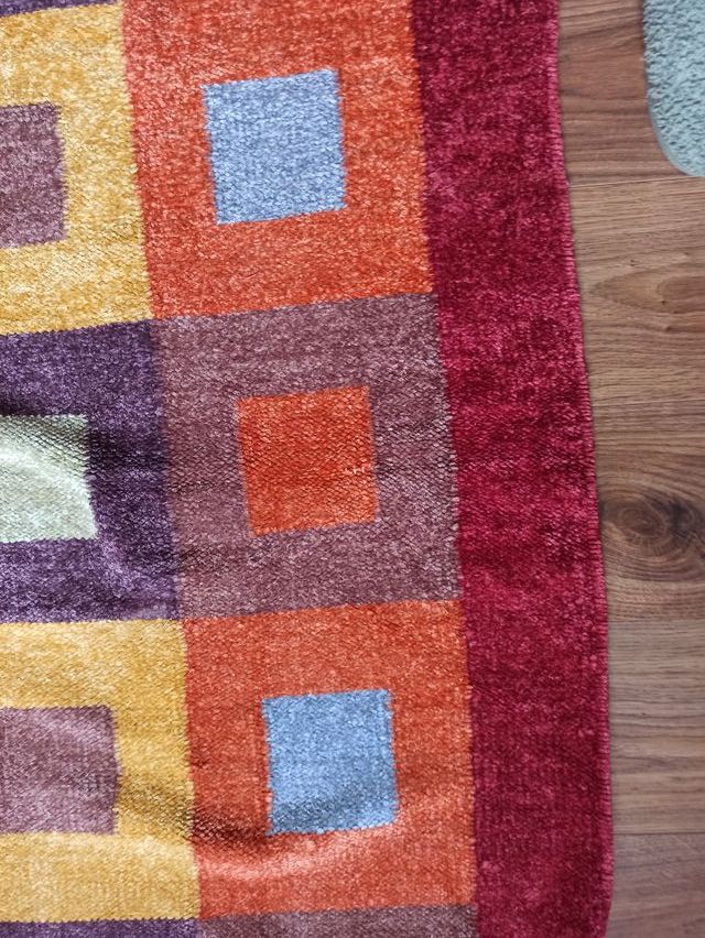 Alfombra colores grande.