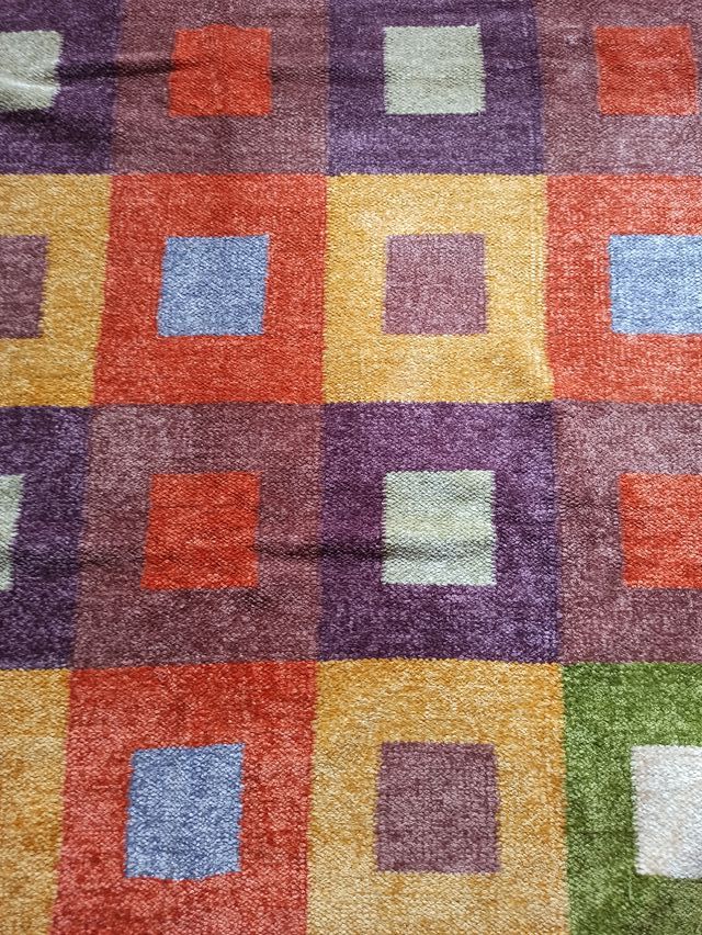 Alfombra colores grande.