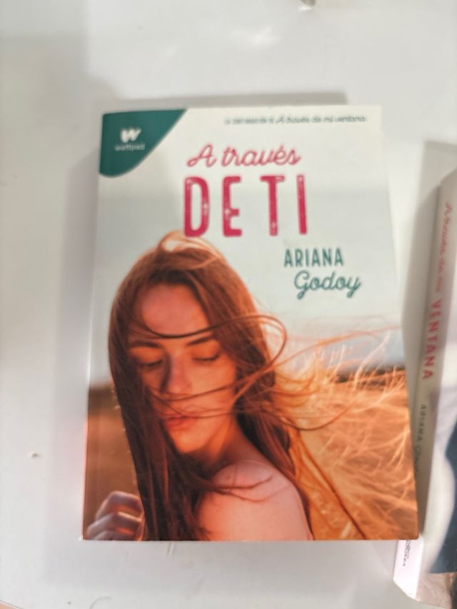 A través de TI y A través de mi ventana