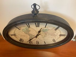 Reloj de pared ovalado