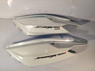 cacha lateral tapa trasera sym joymax 125 2018