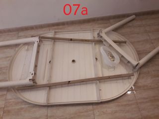 Mesa de jardin, dos posiciones: ovalada y circular