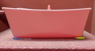 1 Bañera rosa plegable bebé STOKKE+ 1 Hamaca BÉABA