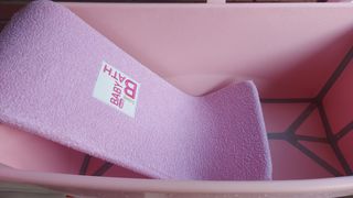 1 Bañera rosa plegable bebé STOKKE+ 1 Hamaca BÉABA