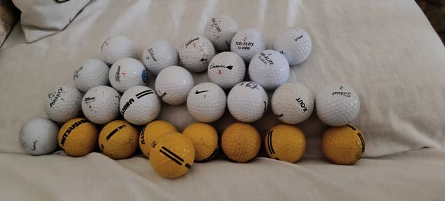 Bolas de golf, 27,