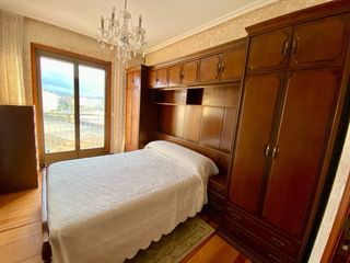 Mueble cabecero para dormitorio con cama