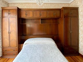Mueble cabecero para dormitorio con cama