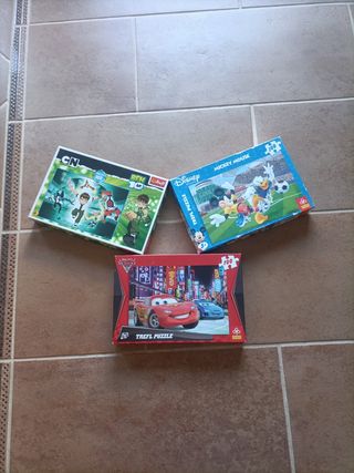 3 puzzles infantiles de 100 piezas.