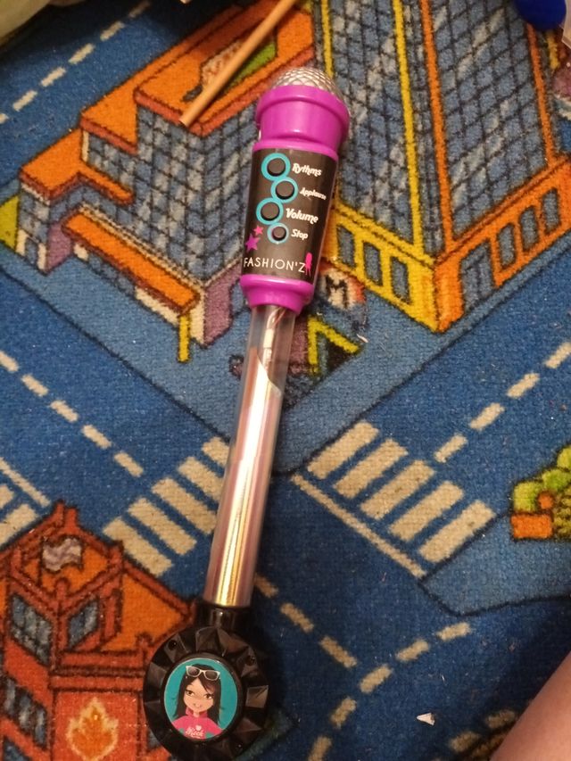 Microfono De baby bag.Tiene musica,sonidos de inst