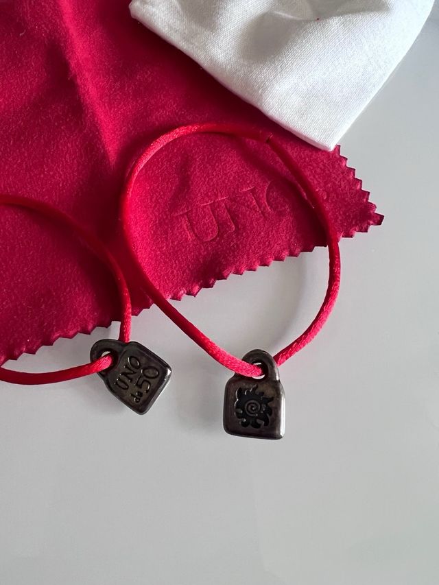 2 pulseras uno de 50 