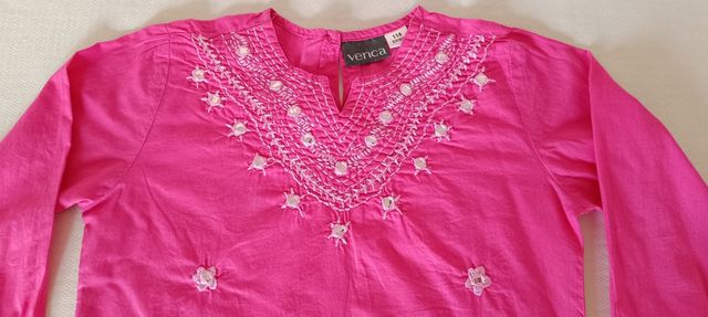 Camisola fucsia 114 cm.