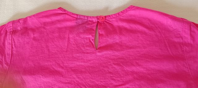 Camisola fucsia 114 cm.