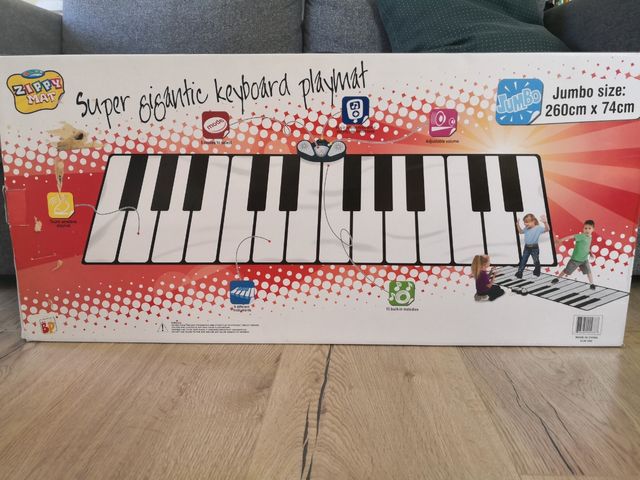 Piano gigante de suelo-manta musical