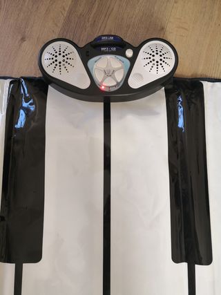 Piano gigante de suelo-manta musical