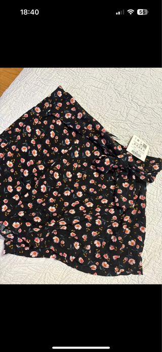 Falta pantalon lazo cremallera flores