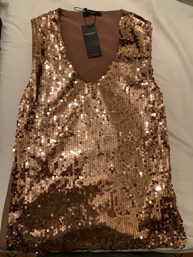 Canotta donna elegante con paillettes.