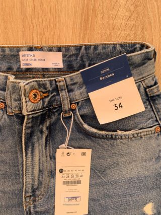 Pantalon azul slim fit abierto Bershka (T. 34EU)