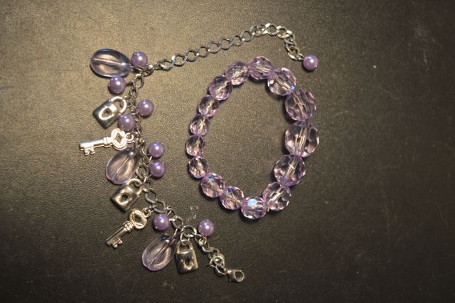 set 10 bracciali rosa e viola