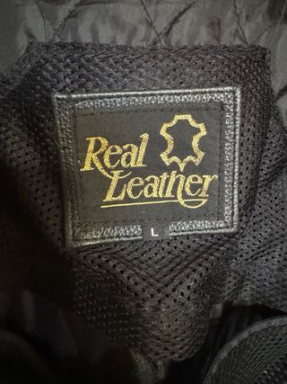 CHAQUETA DE MOTO DE CUERO VINTAGE RED BULL FIRMADA