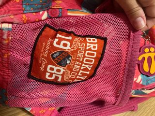 Mochila Totto adaptable a carro rosa